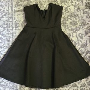 Black low V mini dress